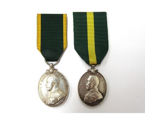 A George V Territorial Force Efficiency Medal named to 57 C.S. MJR. C.J. BUGGY. 21/LOND. R. together with a George V Territor
