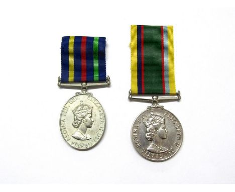 An EIIR Cadet Forces Medal named COLLECTORS ITEM, together with an EIIR Civil Defence Long Service Medal (British type) (2)