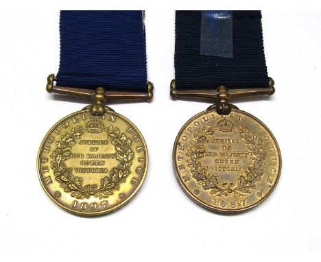 Two Victoria Jubilee (Metropolitan Police) medals: 1887 named to E. MILLS ESQ. CHIEF CLK. RECRS. OFFR. and 1897 named to P.C.