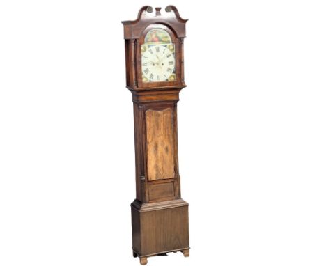 A Late George III mahogany long case clock with painted dial on bracket feet. With weights and pendulum. 225cm