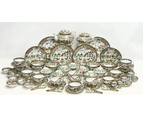 A 65 piece Early 20th Century Chinese Famille Verte “Cockfighting” tea service. Late Qing Dynasty/Early Republic Period. Teap