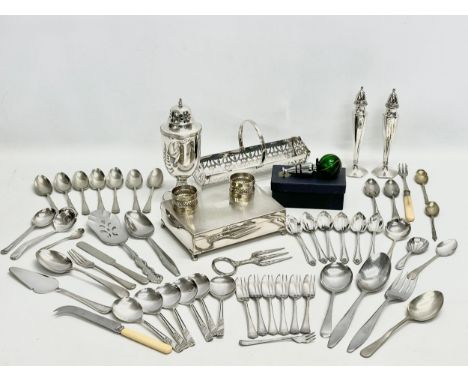 A collection of silver plate and stainless steel. E.P and stainless cutlery. House of Marbles wine bottle stopper. Silver pla