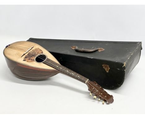 Giuseppe Puglisi Reale &amp; Figli. An Early 20th Century mandolin with case.