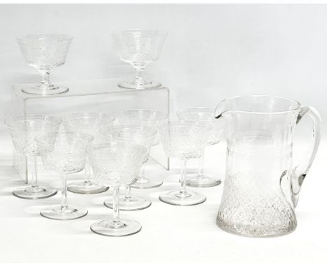 An 11 piece Early 20th Century Pall Mall Lady Hamilton etched glass drinks set. Including a pitcher jug with 8 matching punch