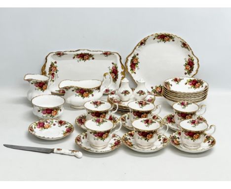 A 33 piece Royal Albert “Old Country Roses” tea service/part dinner service.
