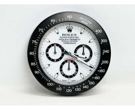 A new Rolex Daytona Oyster Perpetual Superlative Chronometer wall clock. Dealer Display Concessionary Clock. 34cm