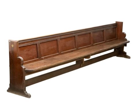 A very large Late Victorian pitch pine church pew/bench. 356cm