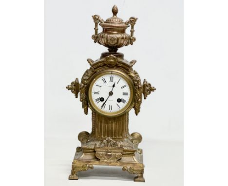 A 19th Century Chancellor &amp; Son, Dublin, brass mantle clock. With pendulum. 16.5x14.5x38.5cm