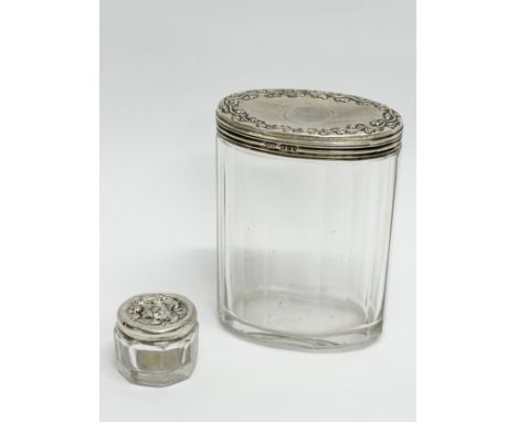 R. Wallace &amp; Sons. Levi &amp; Salaman. 2 silver lidded glass jars. Early 20th Century. 7x9cm. 3x2.5cm (2)