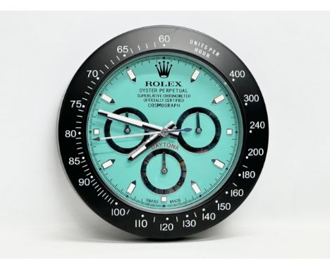 A new Rolex Daytona Oyster Perpetual Superlative Chronometer wall clock. Dealer Display Concessionary Clock. 34cm