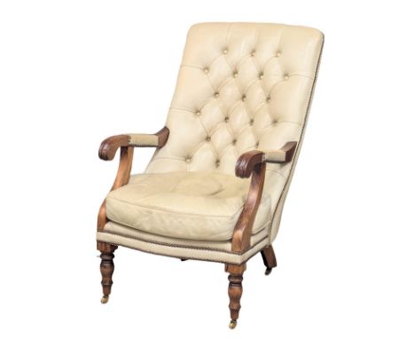 A William IV style deep button back leather armchair.