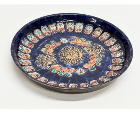 Jean Claude Taburet (1926-2013) A signed French enamelled earthenware shallow bowl. Quimper. France. 25x4cm