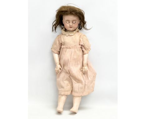 A large Early 20th Century French porcelain doll. By S.F.B.J, Paris. 52cm