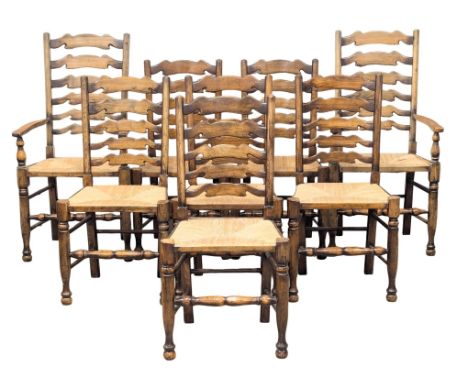 A set of 8 Early 19th Century style dining chairs with ladder back and rushed seats