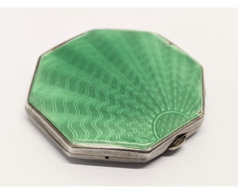 A silver and enamel Art Deco compact    (7)