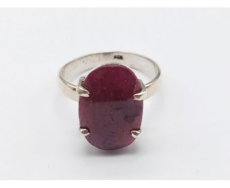 A sterling silver gemstone ring set with 11ct natural red ruby, oval cut, hallmarked, 9g total weight size T 