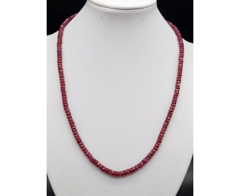 A 120ct ruby gemstone necklace, gilt clasp length 18" 