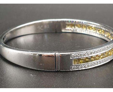 18ct White Gold Hinged Bangle with Channel Set Diamond ( 0.90ct) and Yellow Sapphire Designed by Alice Vancal 24.5g 