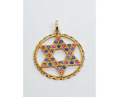 18k Yellow Gold Ruby and Sapphire Star of David Pendant. 15 Rubies and 15 Sapphires complete this wonderful piece. 4.26g 