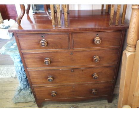 A Victorian mahogany chest of two short and three long drawers on bracket feet