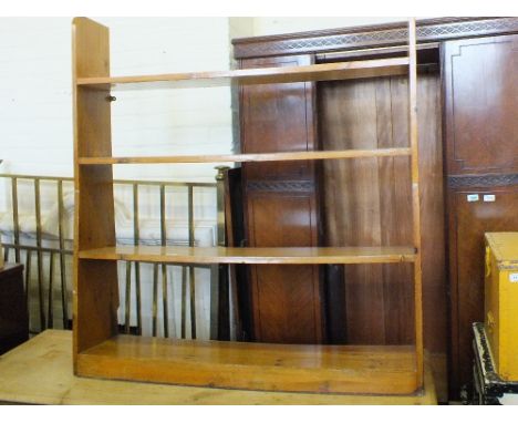 A pine four shelf open bookcase