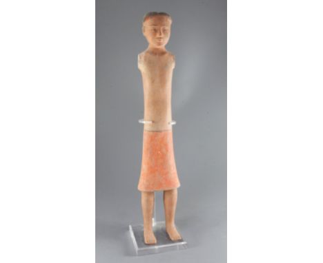 A tall Chinese pottery stick figure of a man, Han dynasty, lacking arms, painted in red and black pigment, height 62cmProvena