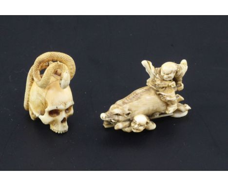 Two Japanese ivory netsuke, Meiji period, the first carved as two huntsmen battling with a boar, two character signature to t