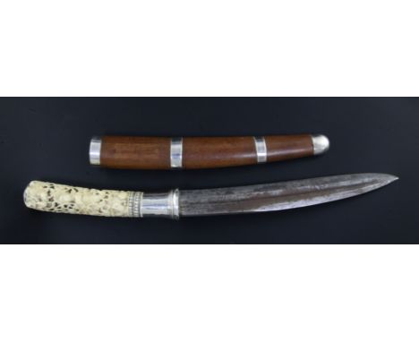 A Burmese ivory handled dha, late 19th century the handle pierced and carved in relief with Buddhist figures, the handle and 