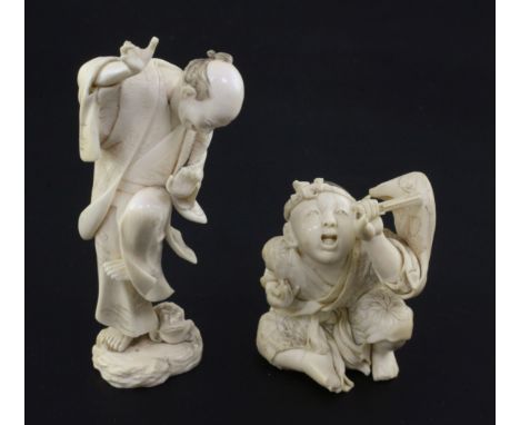 Two Japanese ivory okimono, Meiji period, the first carved as a seated boy holding a fan, unsigned, 7cm, the second a man sur
