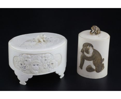 Two Japanese ivory jars and covers, early 20th century, the first carved in relief with animals, on shaped feet, 12.5cm, the 