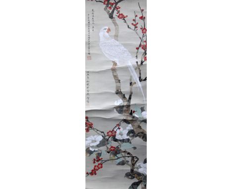 Xue Weng (Chinese, mid 20th century), a scroll painting of a cockatoo amid plum and magnolia blossom, signed, inscribed and d