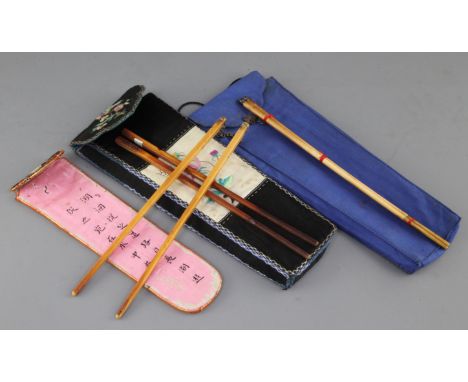 A Chinese embroidered chopstick case and three pairs of ivory chopsticks, late 19th / early 20th century,