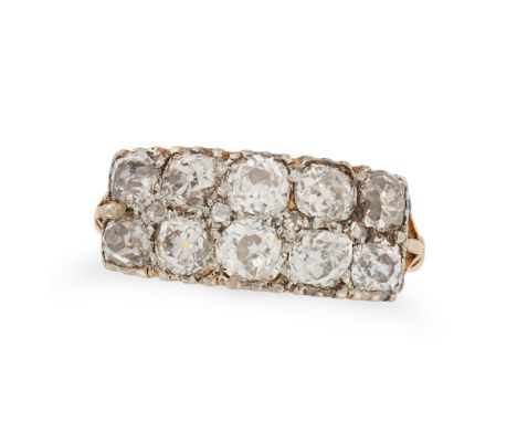 AN ANTIQUE DIAMOND RING in yellow gold, set with two rows of old cut diamonds, accented by small rose cut diamonds, the diamo