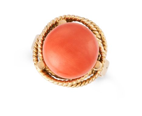 A VINTAGE CORAL RING set with a polished coral of 12.9mm within a twisted rope work border, no assay marks, size N / 6.75, 9.
