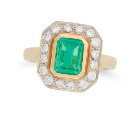 AN EMERALD AND DIAMOND CLUSTER RING in 18ct yellow gold, set with an octagonal step cut emerald of approximately 1.25 carats 