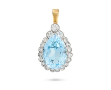 A BLUE TOPAZ AND DIAMOND PENDANT in yellow gold, set with a pear cut blue topaz of approximately 11.93 carats in a cluster of
