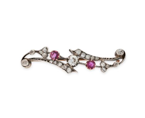 AN ANTIQUE RUBY AND DIAMOND BROOCH in yellow gold and silver, the scrolling brooch set with old and single cut diamonds, acce