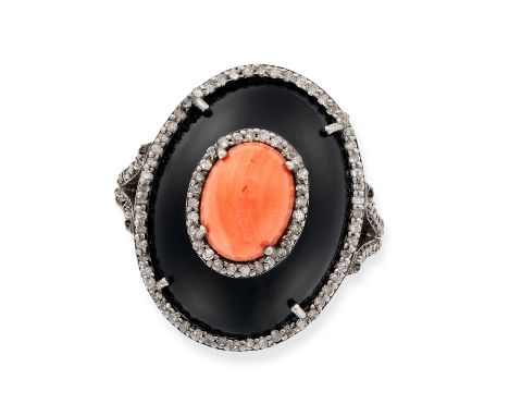 A CORAL, ONYX AND DIAMOND DRESS RING the oval face comprising polished onyx set with an oval cabochon coral, accented by bord