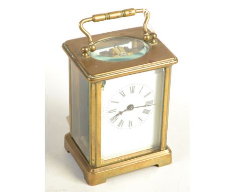 A French brass Corniche cased carriage clock with cylinder escapement. Height 10.5cm. 