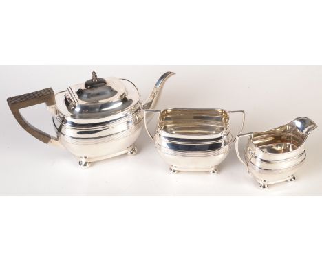 A three piece tea service.