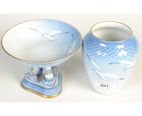 A Bing and Grondahl vase with scale rim, decorated with seagulls, together with a a matching bon bon stand with dolphin suppo