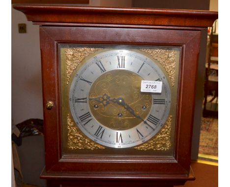 A 20th century grandmother clock with a brass dial in a mahogany effect case.