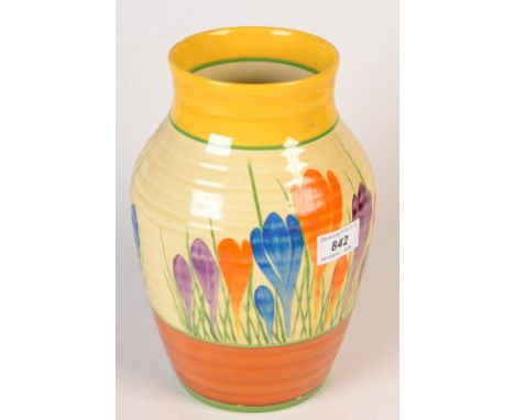 A Clarice Cliff "Crocus" pattern Isis vase (damage), height 25cm, together with a similar Newport Pottery conserve jar and li