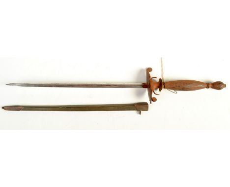 An 18th century dagger with faceted steel grip, faceted steel ovoid pommel with discus and horn-like inner quillons, the tria