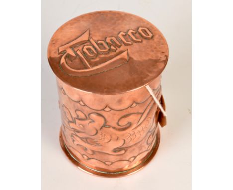 A Newlyn Copper circular tobacco jar, relief decorated with a sea dragon. Impressed Newlyn. Height 10cm. 