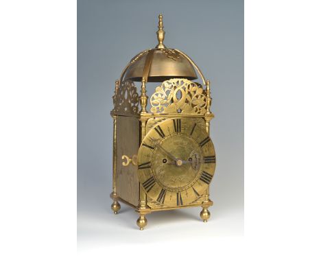 A late 17th century brass lantern clock, signed "John Barnett at Ye Dyall in Lothbury Londini Fecit", with a later twin fusee