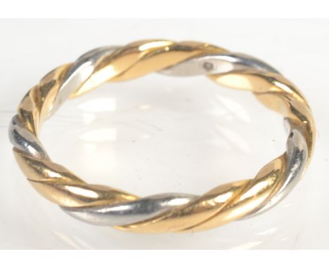 A white and yellow 18ct. gold spiral ring by Boodles. Condition Report: Diameter 16.5 mm., size K/L
