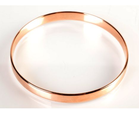 A gold bangle, 20.6g.