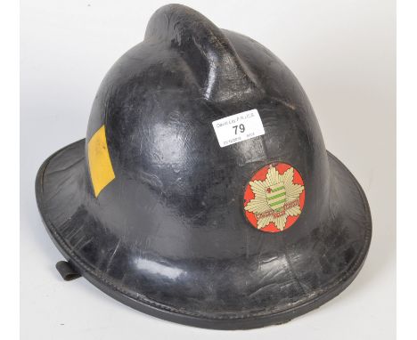A 1970`s Wiltshire Brigade helmet made by Cromwell.