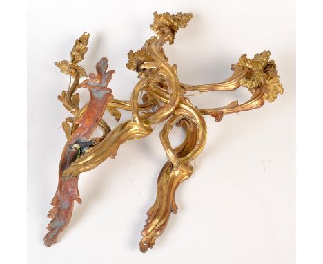 Three gilt metal rococo twin branch wall light fittings.